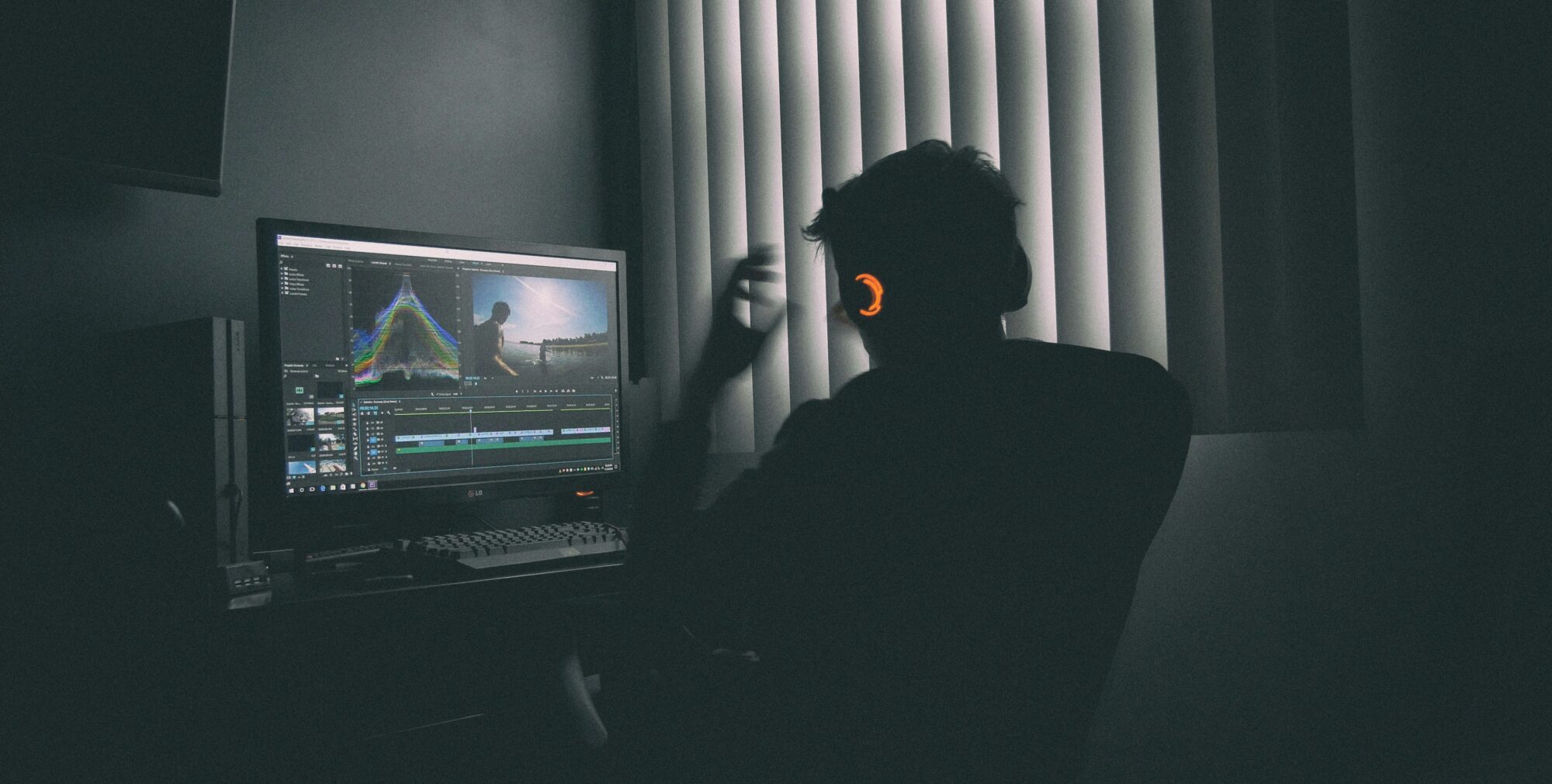 Video editor at Corridor Media working on real estate footage, vertical and horizontal formats.