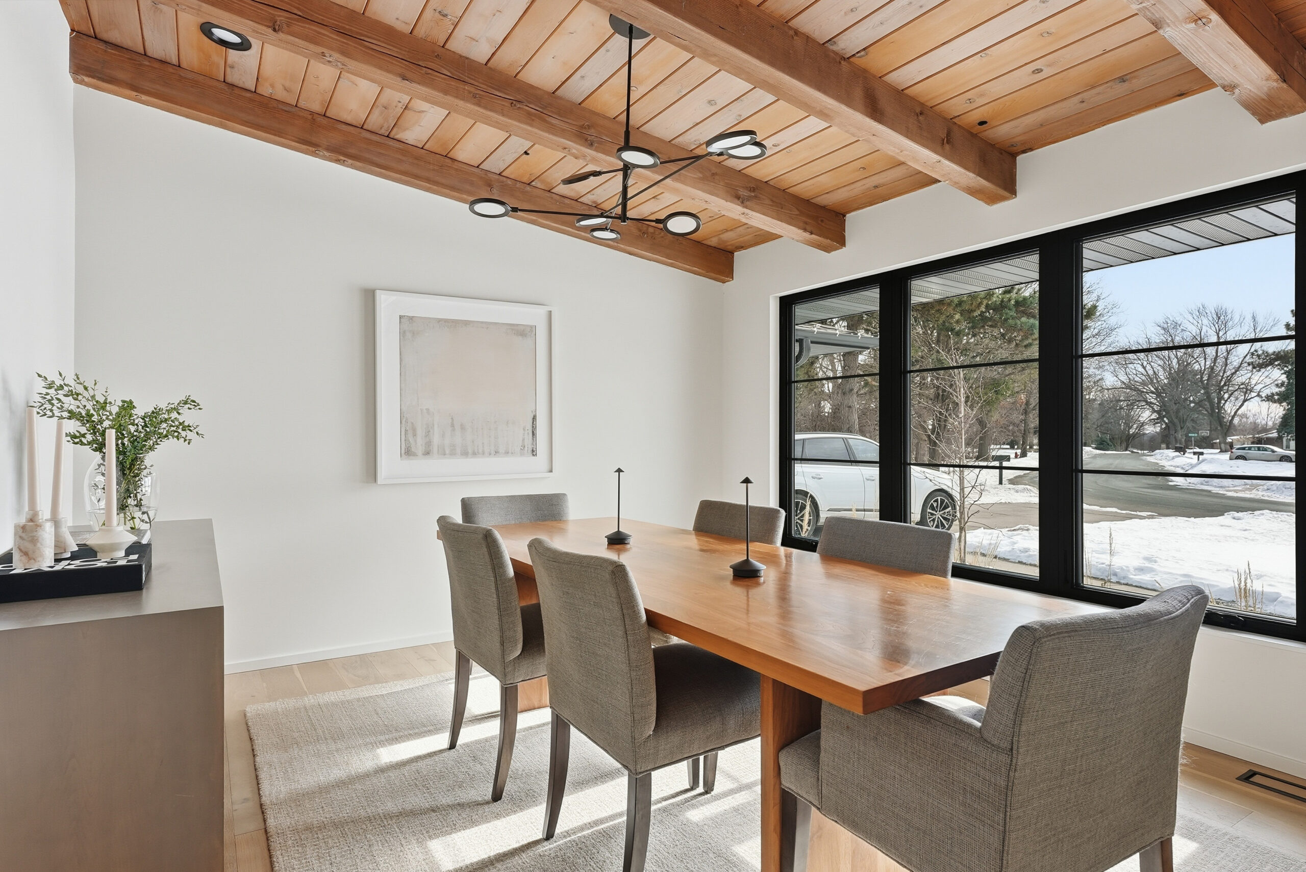 Modern dining room interior showcasing photography and design for Corridor Media services.