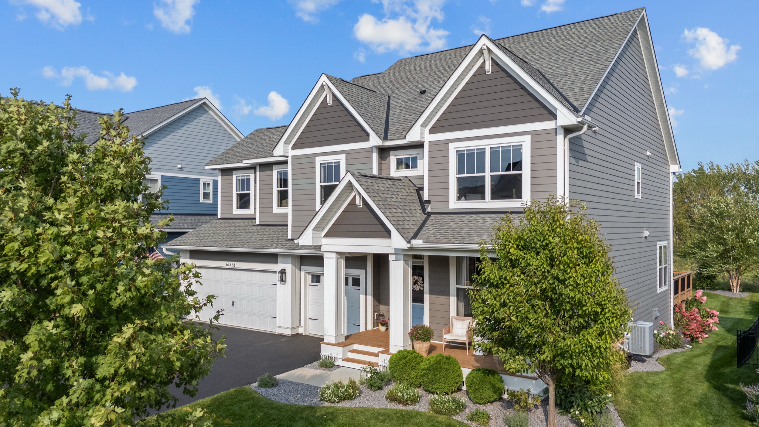 Real estate photography of a modern home showcasing architectural details and landscaping.