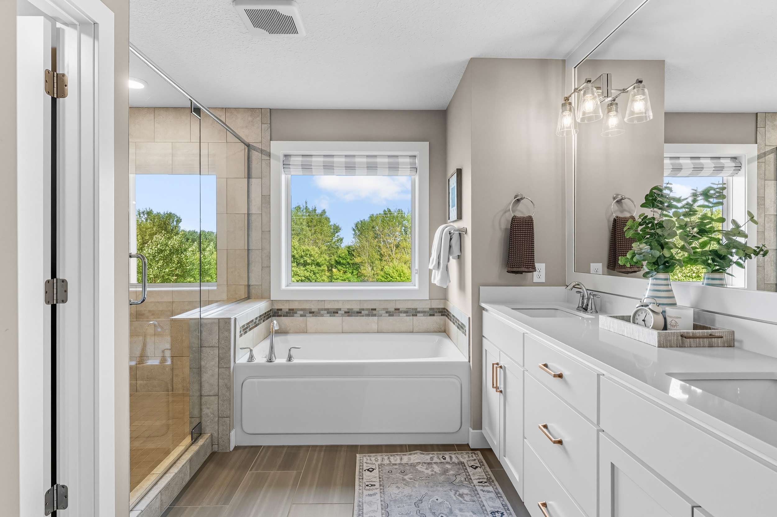 Interior photography of a modern bathroom showcasing real estate videography and photography services.