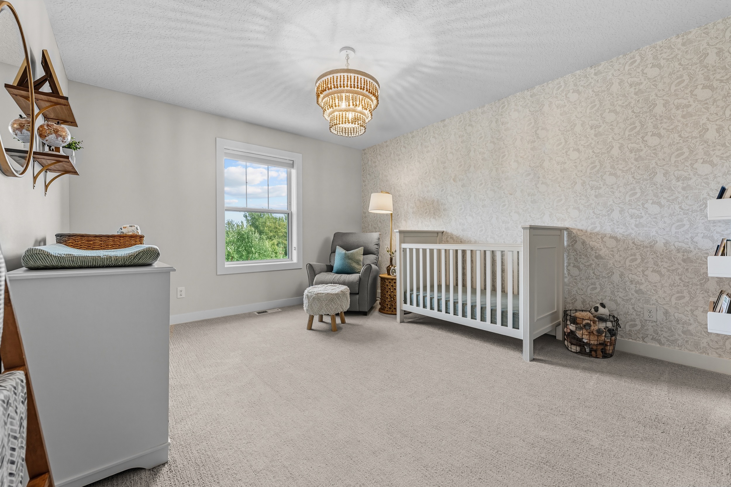 Real estate interior photography showcasing a stylish nursery room and Corridor Media services.
