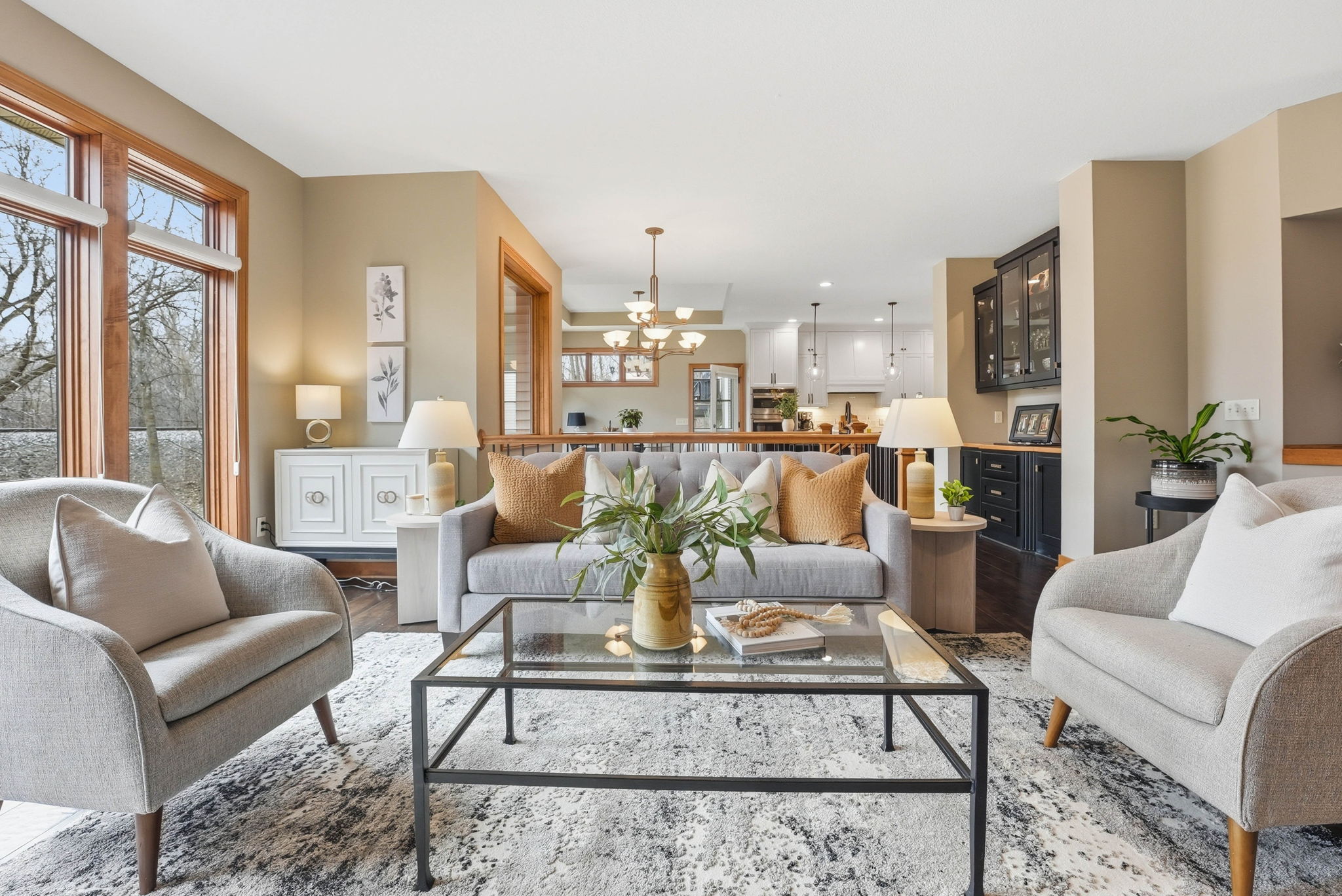 Updated Arden Hills walkout rambler living room and kitchen featuring natural light.