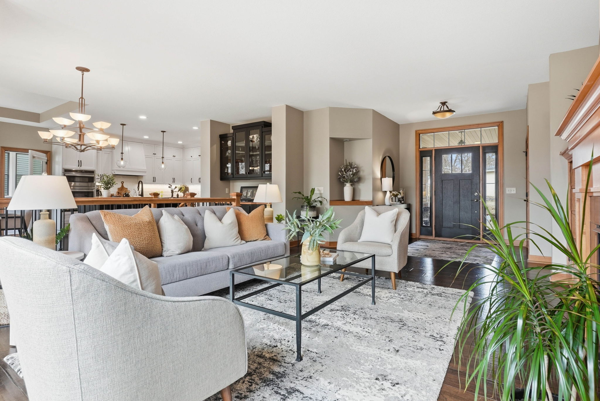 Remodeled Arden Hills walkout rambler living room and kitchen featuring modern design.