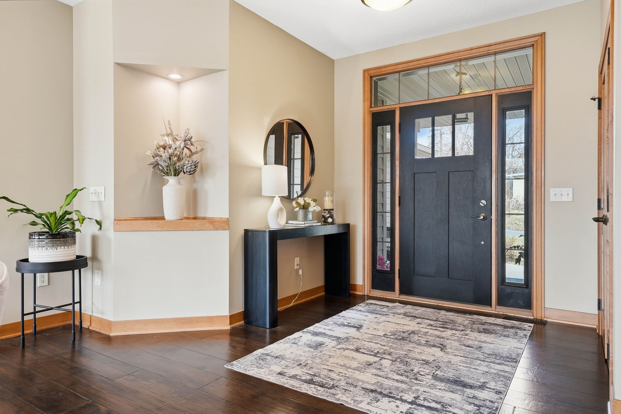 Bright entryway and front door of Arden Hills walkout rambler home.