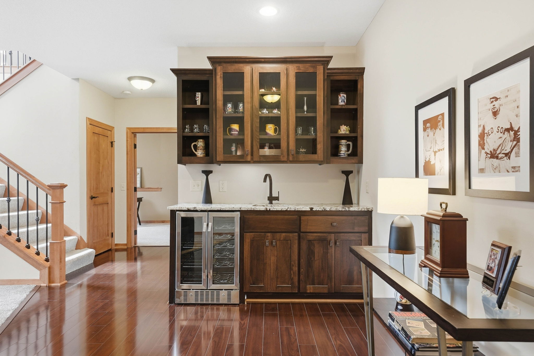 Remodeled kitchen with custom cabinetry, wine fridge, and walkout rambler details.
