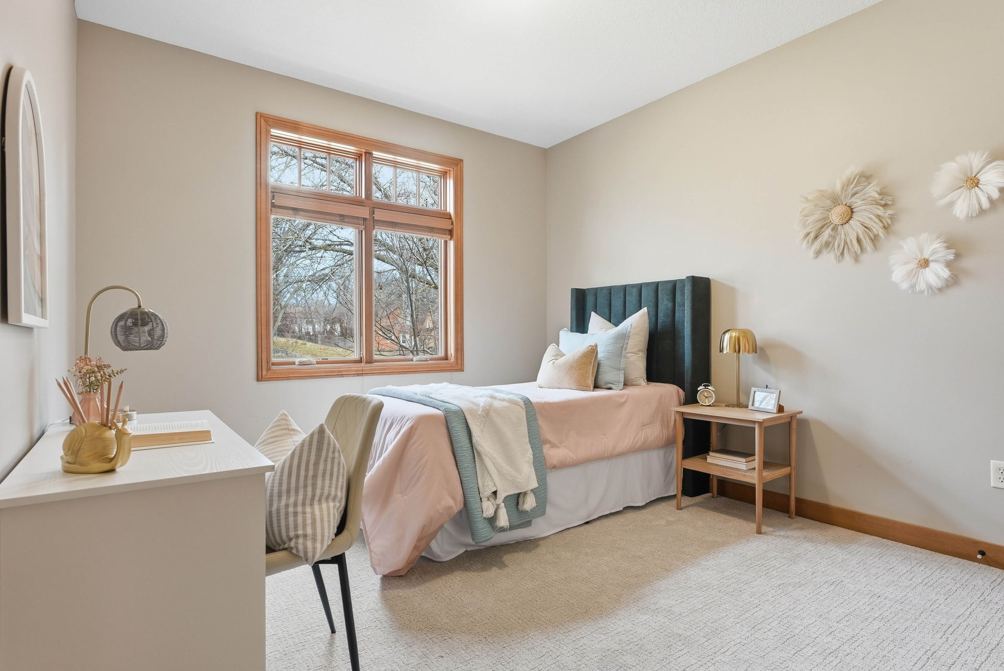 Well-maintained bedroom with hardwood floors and updated layout in Arden Hills home.