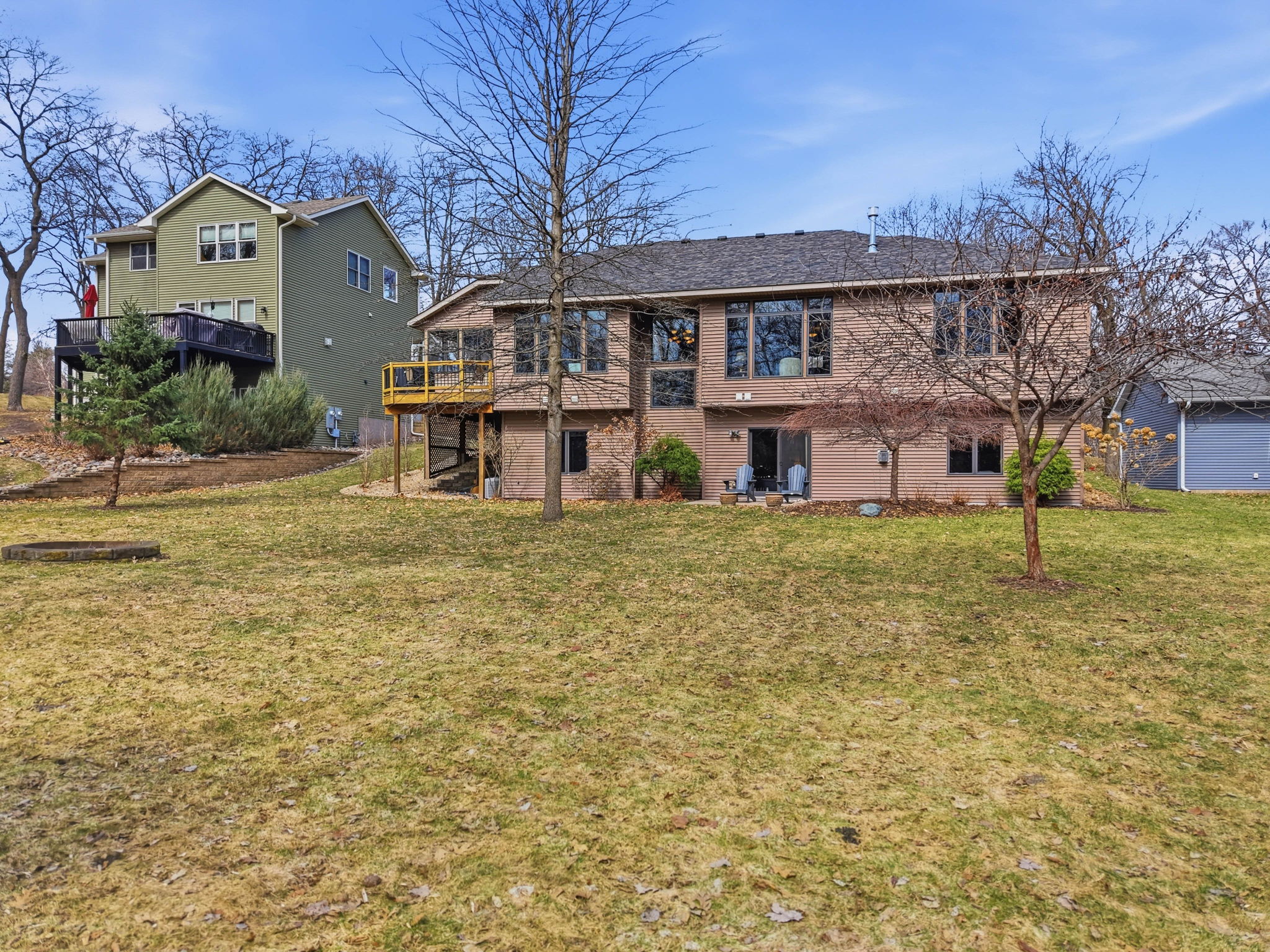 Walkout rambler in Arden Hills, MN, with deck and spacious backyard, Mounds View school district.