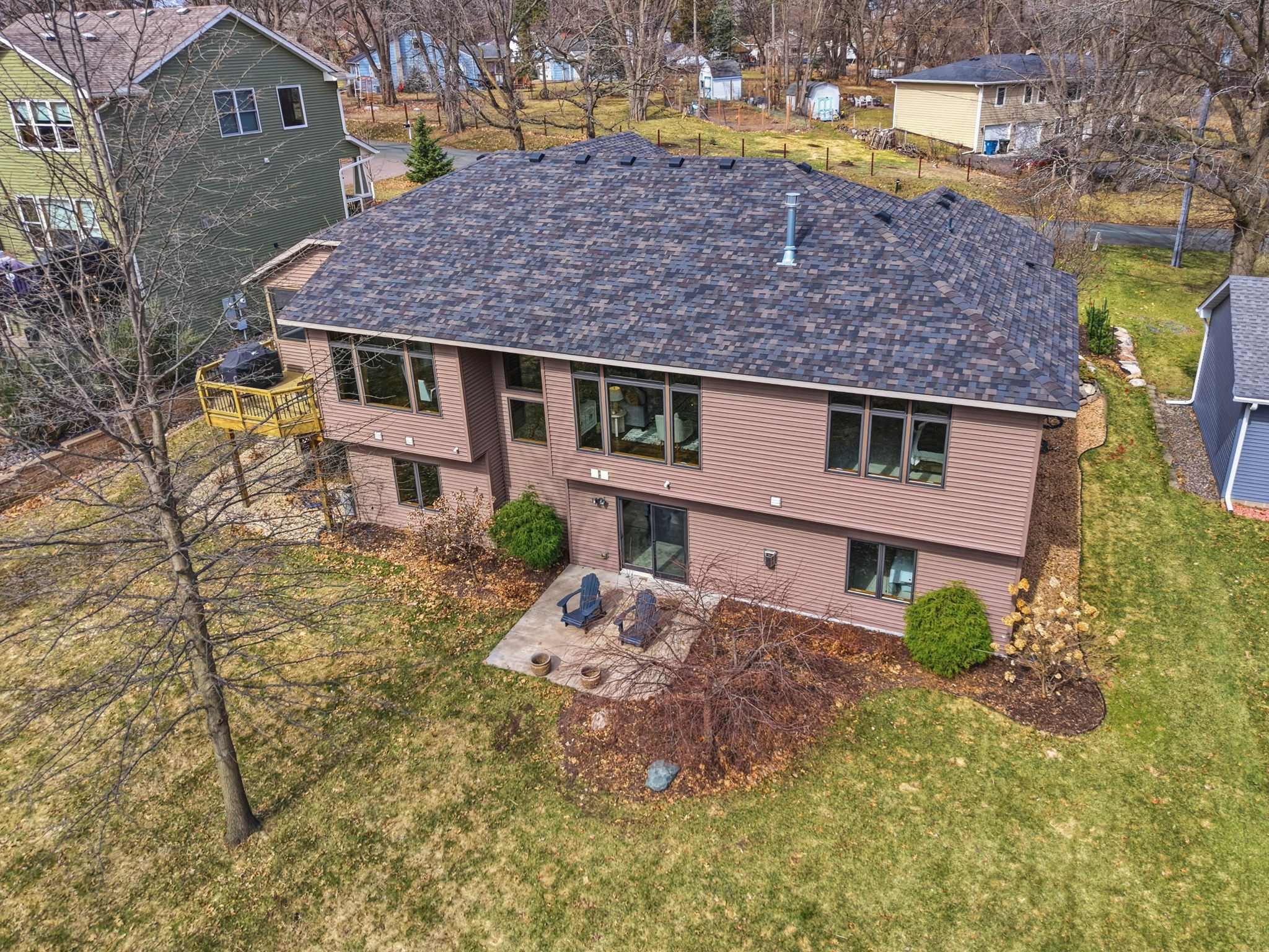 Walkout rambler home exterior, Arden Hills, MN, with updated roof and private backyard.