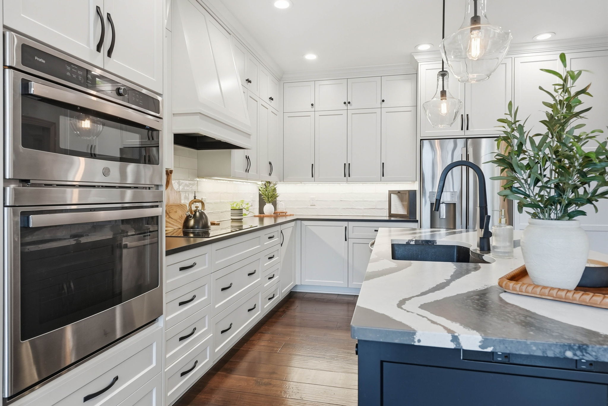 Remodeled kitchen with stainless steel appliances and updated finishes in Arden Hills home.